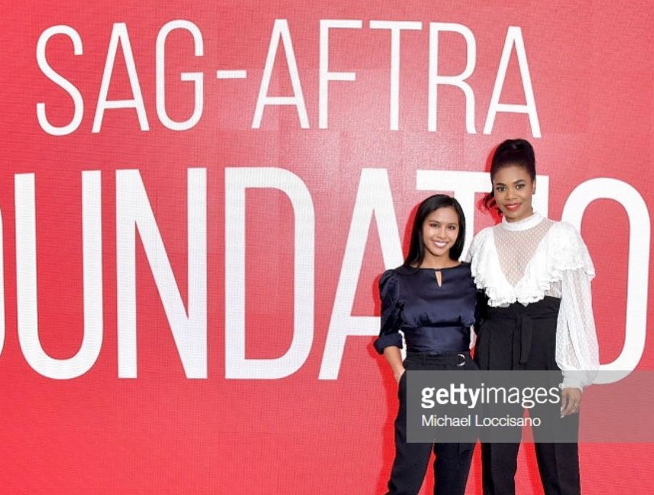 Azia Celestino and Regina Hall